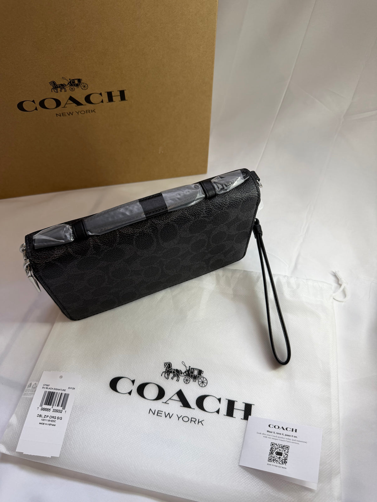 Pochette portefeuille Coach